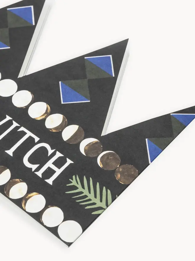 black crown shaped card with 'chief witch' text