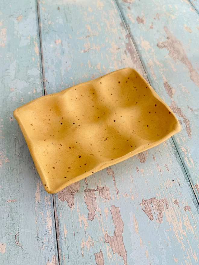 Yellow speckled egg tray kitchen storage