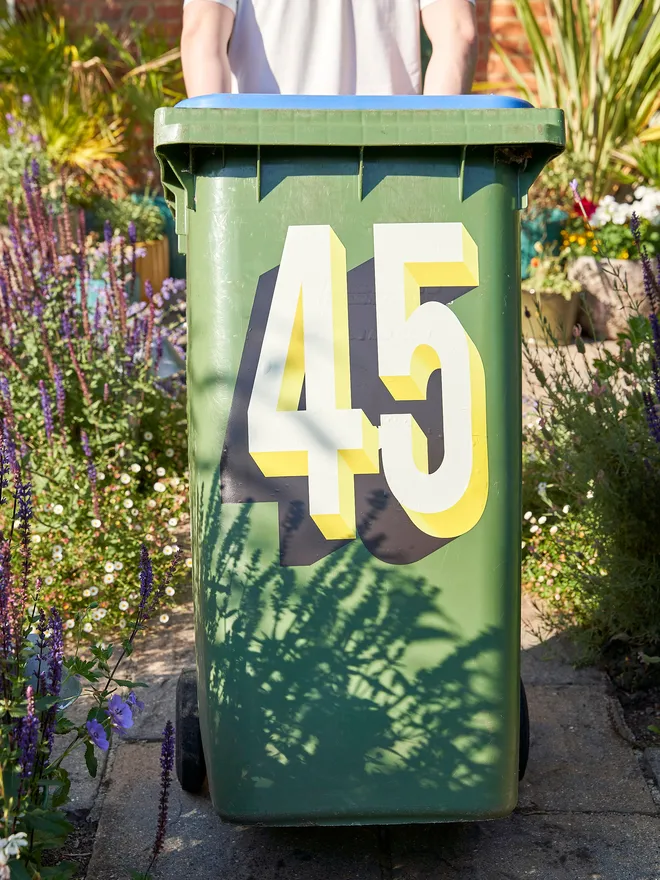 45 Bin Number on a green bin 