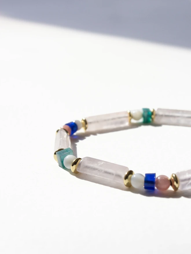 Beaded bracelet with natural beads on a white background