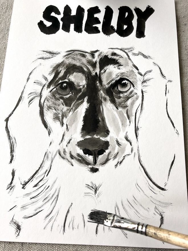 artist 'Dogs by Jeff' painting a personalised dog portrait of a long haired dachshund 