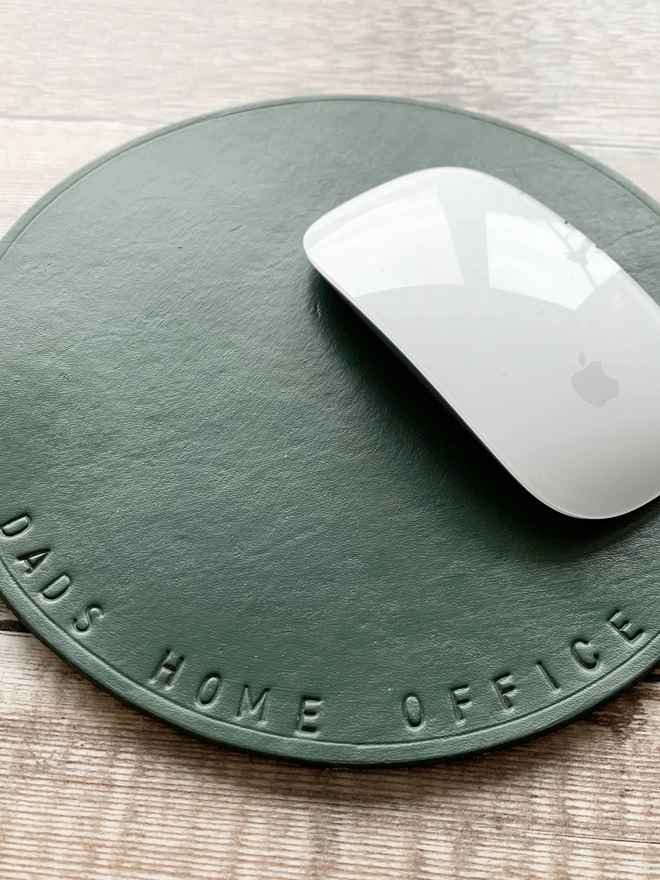 olive green leather mouse  stamped with 'Dads Home Office'mat
