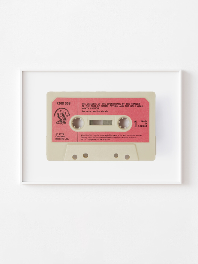 Monty Python Soundtrack Print. A large print in the shape of a cassette of the Monty Python soundtrack