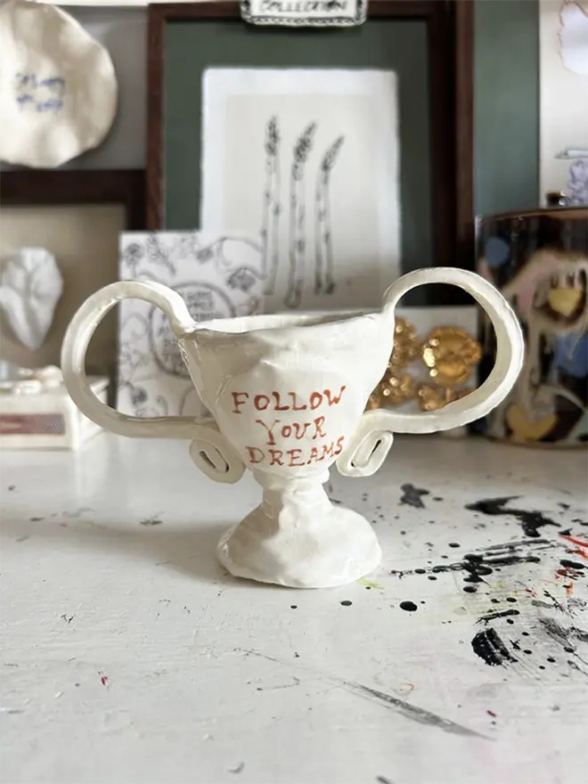 Follow your dreams mini ceramic trophy