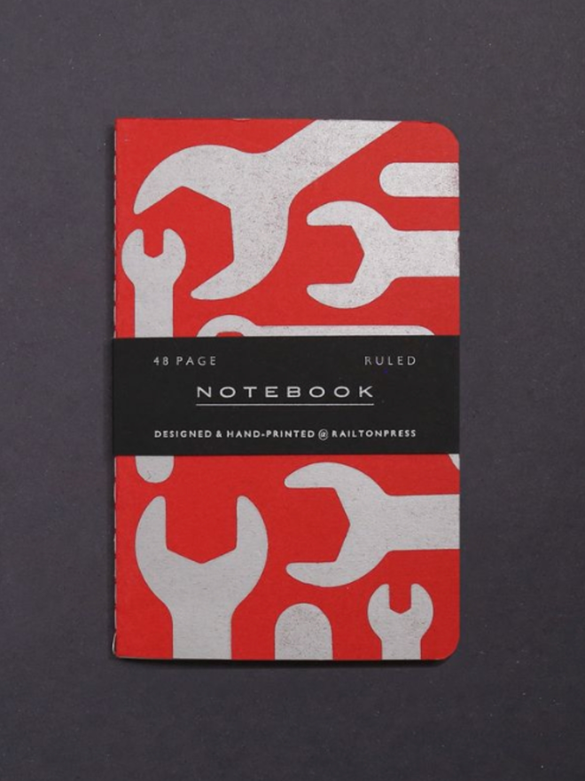 Lined Spanner Pocket Notebook. A notebook in red