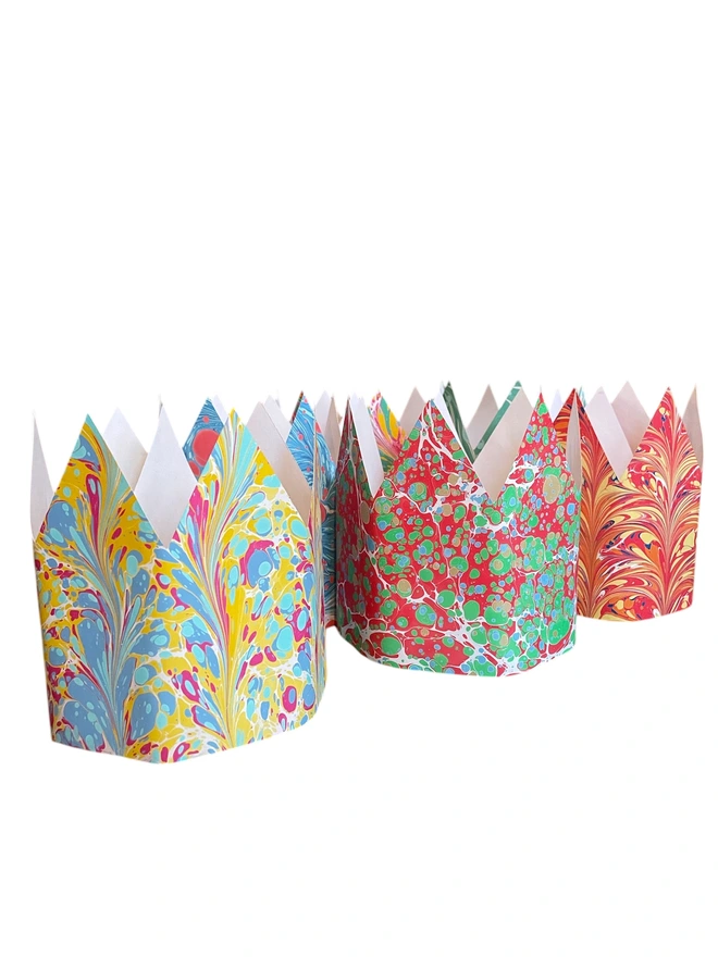 Hand-marbled paper party crowns for Christmas, birthdays and all celebrations