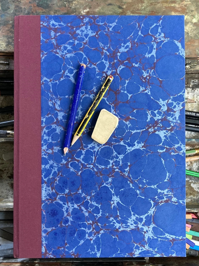 Portrait Sketchbook. A closed sketchbook.