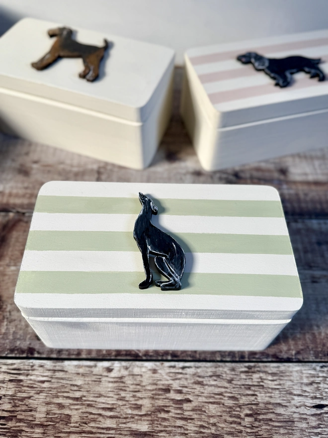 Seated greyhound dog memory keepsake box with green and white stripes 