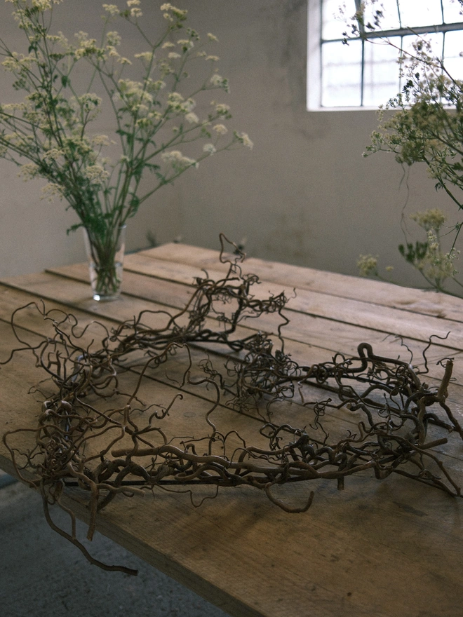 heart shaped wreath made from dried willow branches