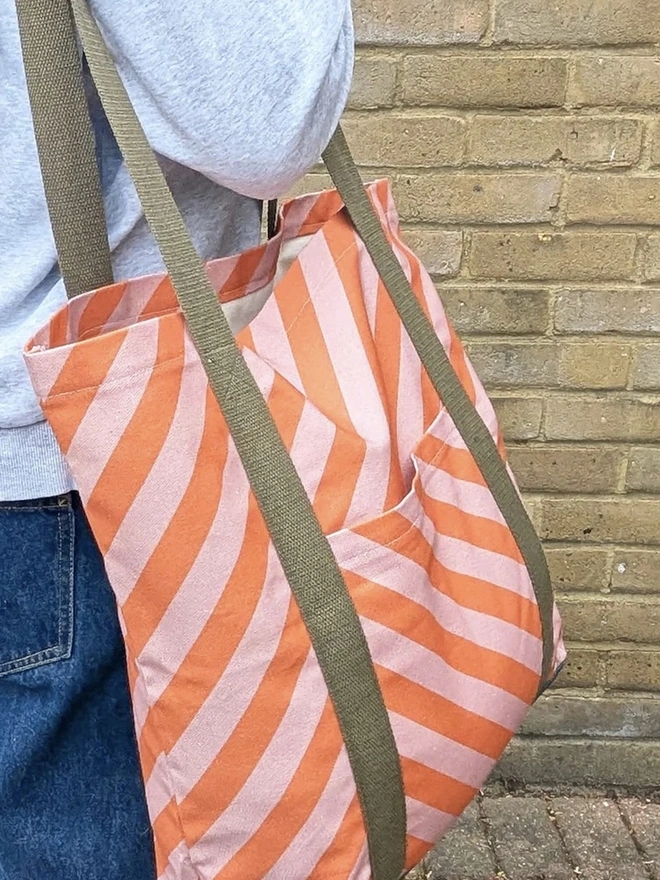 Tote Cotton Shopper Bag, a woman holding a colourful patterned tote bag over her shoulder. 