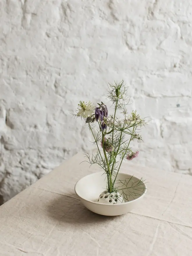 white stoneware flower bowl
