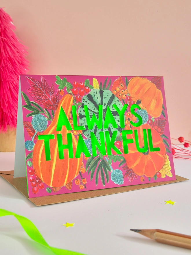 Pumpkin Thanksgiving card with Always Thankful paper cut text and neon green backing paper 
