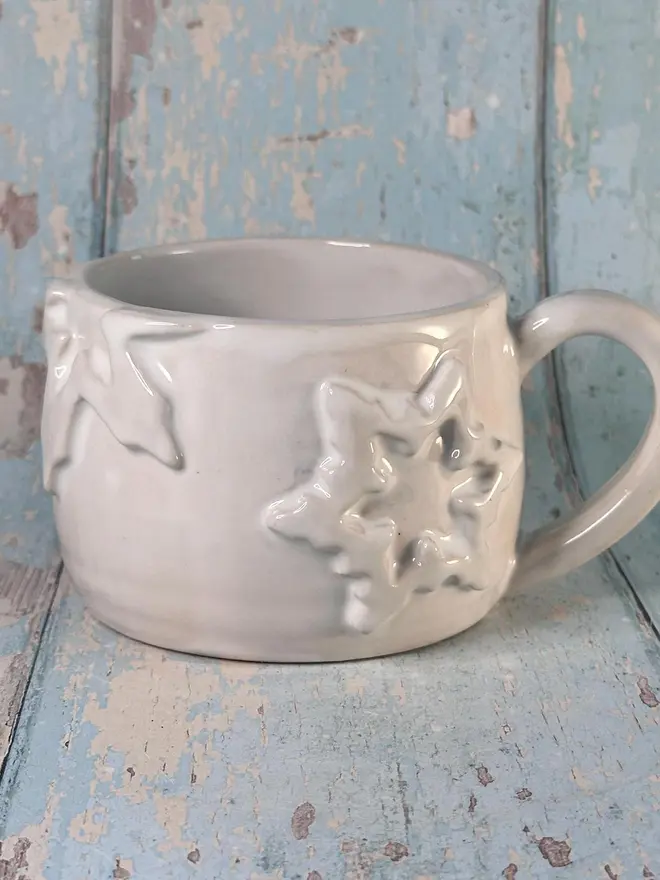 white snowflake mug
