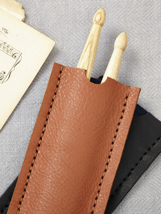 tan leather drumstick holder