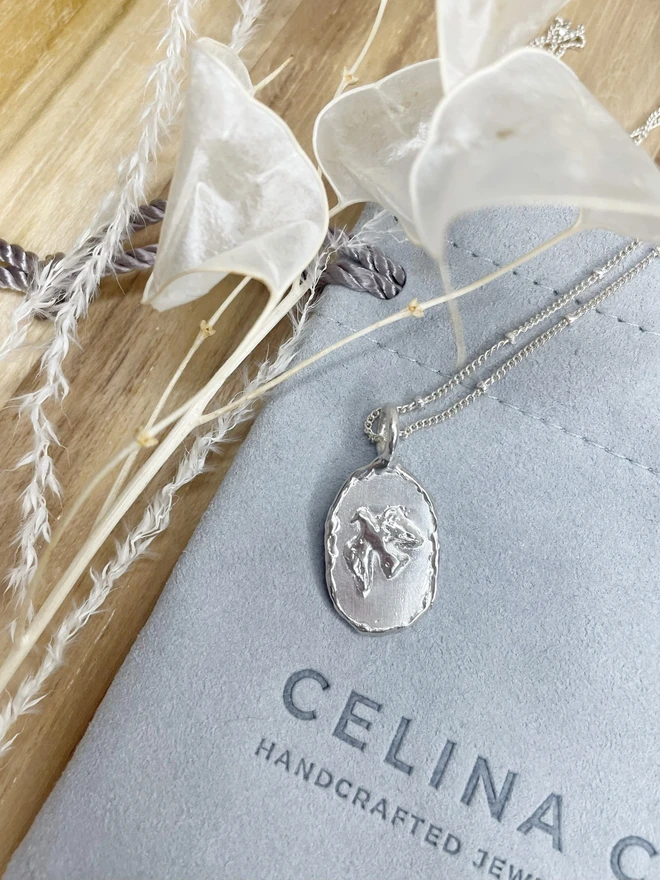 Hand made heart charms made from 100% recycled sterling silver, cute gift for girlfriend or wife for Valentine's Day or Mother's Day. Send straight to your special someone. Made by Celina C Jewellery, a small business in the UK, find on Holly and Co.