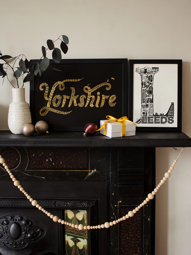 Yorkshire and Leeds framed prints on mantlepiece