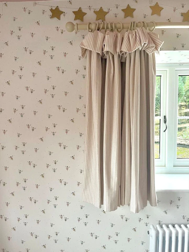 Ducks In A Row Fairy Dust Wallpaper in Nursery with window, pretty striped curtains and star garland