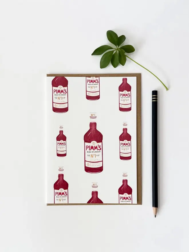 pimms bottle illustrated card. card photographed against white background.