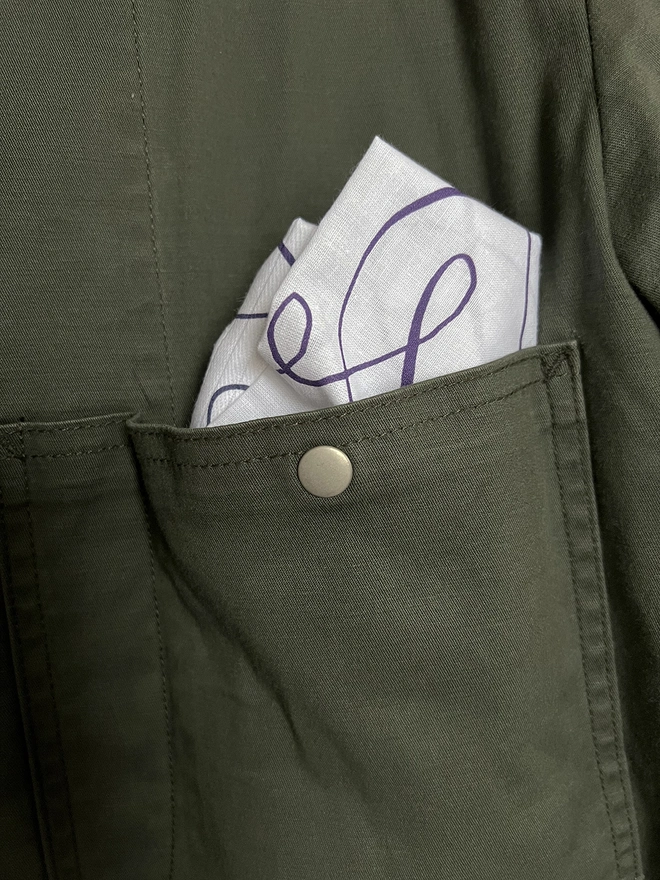 A Mr.PS Anywhere Everywhere Together With You printed cotton handkerchief folded in a jacket pocket