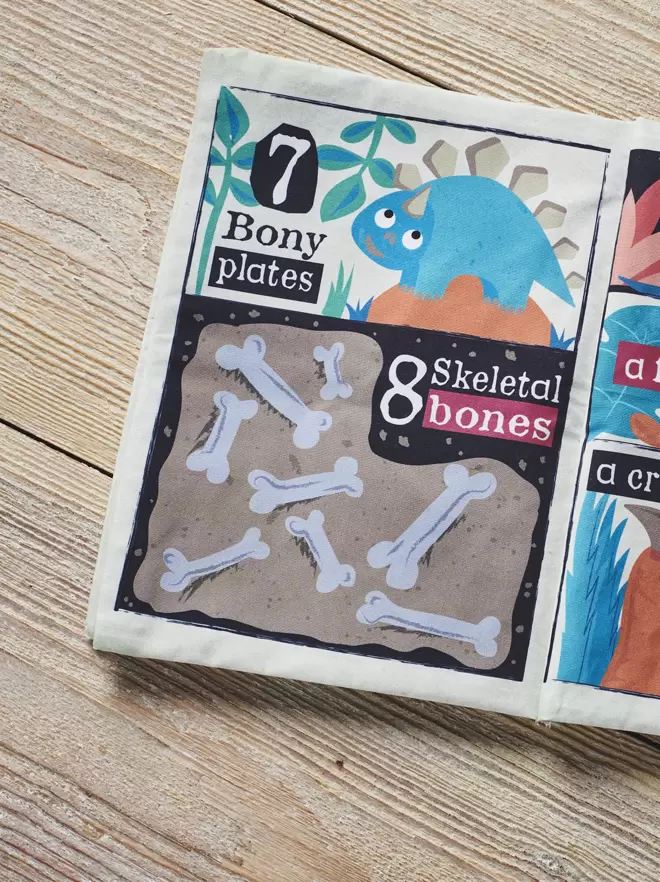 Dinosaur Counting 1-10 crinkly cloth book open at page 3