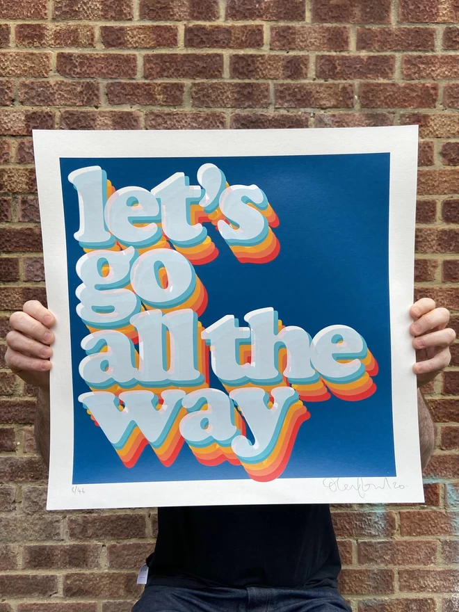 "Let's Go All The Way" Hand Pulled Screen Print on blue background with rainbow letters that say lets go all the way 