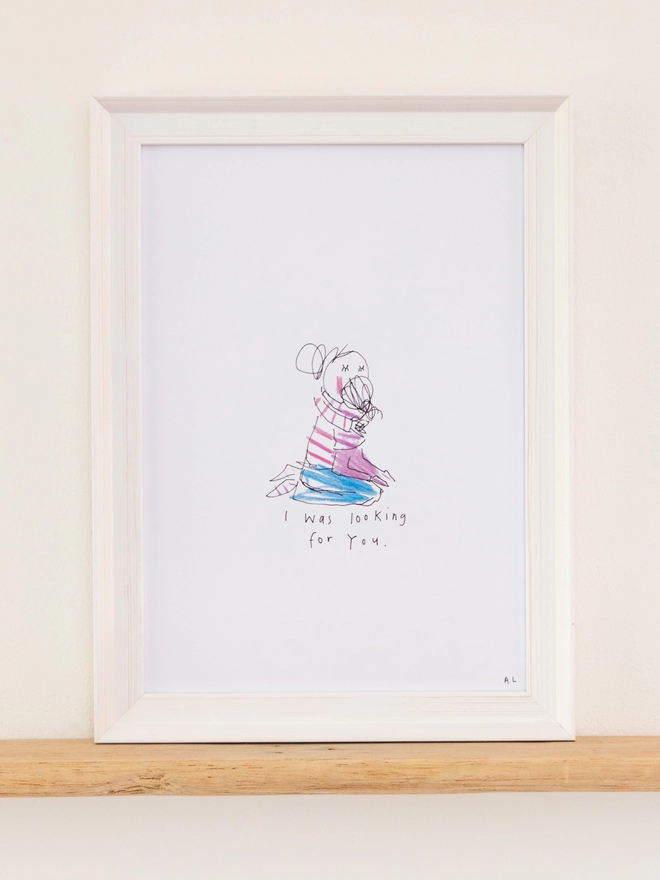 A sketchy muma print in a white frame