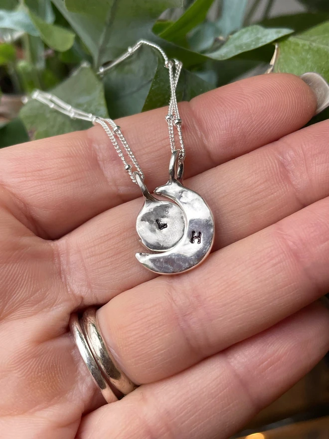 Hand made sun and moon friendship necklaces made from 100% recycled sterling silver, cute gift for girlfriend or wife for Valentine's Day, Galentine's Day or Mother's Day. Send straight to your special someone. Made by Celina C Jewellery, a small business in the UK, find on Holly and Co.