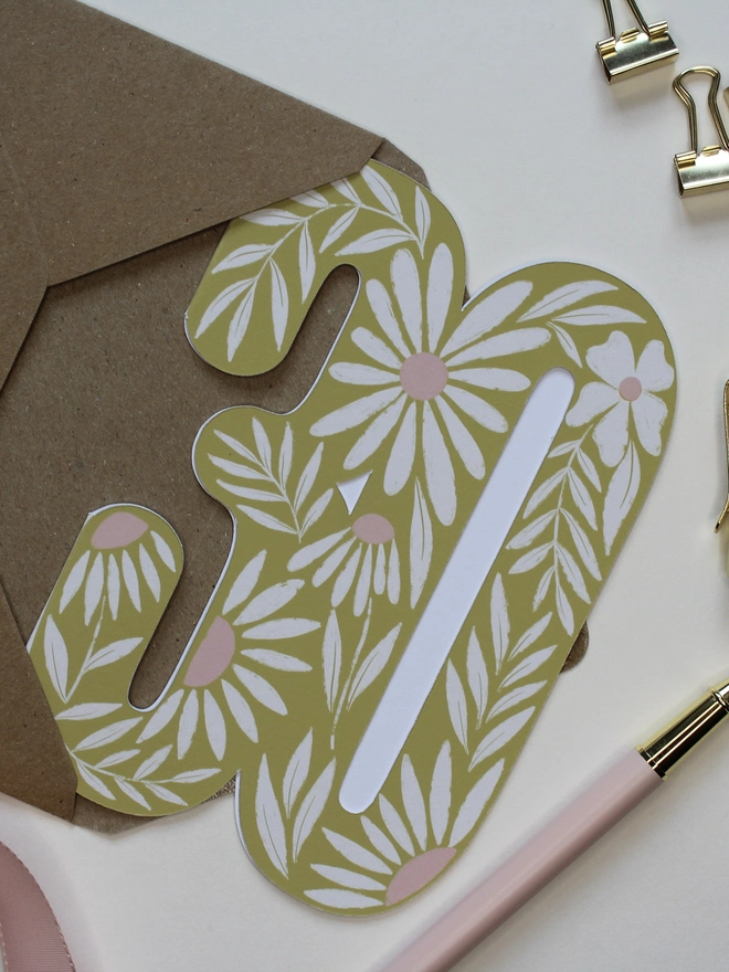 floral 30th birthday card. card shaped like 30 with illustrated daisies.