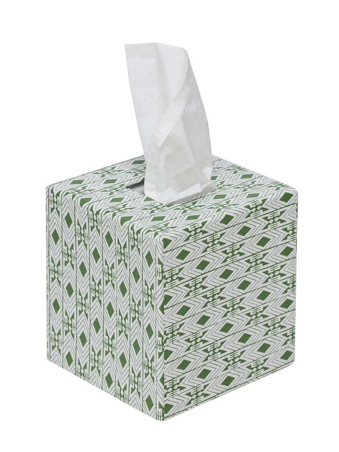 Tijan Tissue Box Cover, a colourful and patterned tissue box sitting on a white surface against a plain backdrop. 