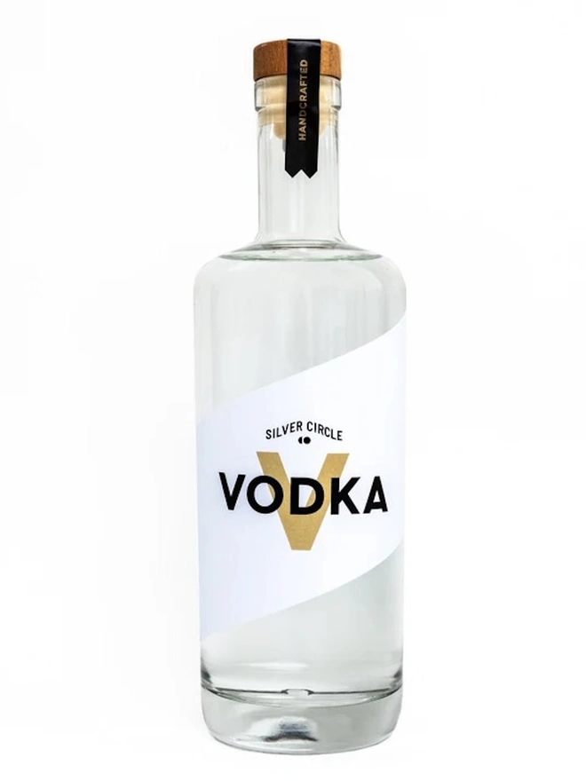 Silver Circle Vodka, bottle of spirit on a white surface. 