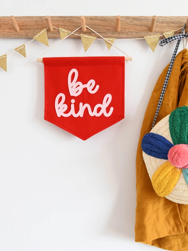 be kind mini felt banner in red and pink.