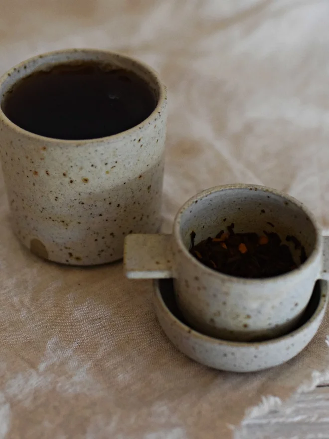 stoneware tea strainer and dish