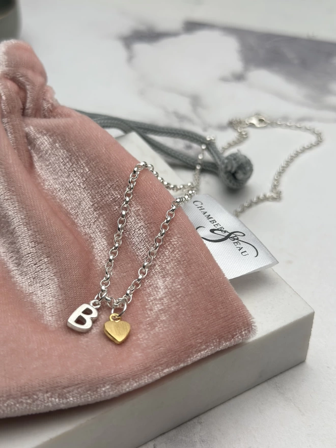 sterling silver chain with sterling silver initial charm and gold mini heart