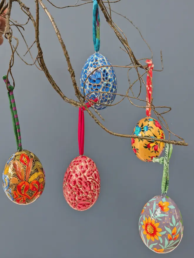 5 handpainted paper mache eggs on branches