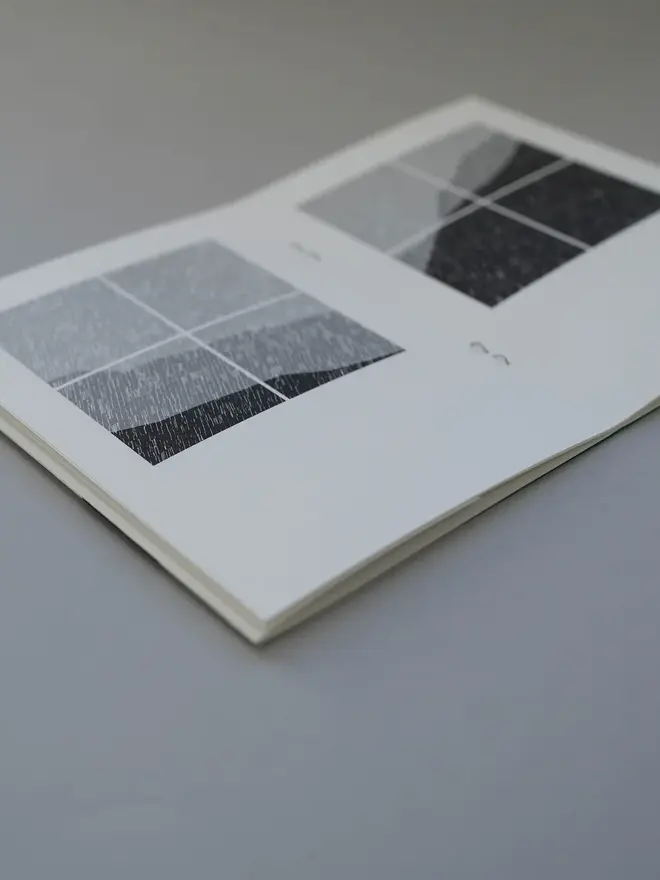 Bothy Book, open positioned on table. 