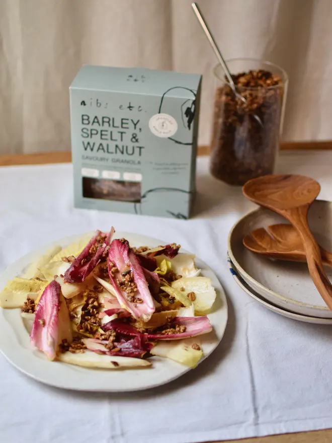 nibs etc. Barley Spelt Walnut savoury Granola topped Endive and Orange Salad