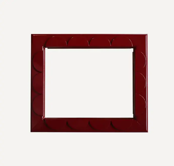 Scallop wood mirror with a scalloped wooden frame on a white background.