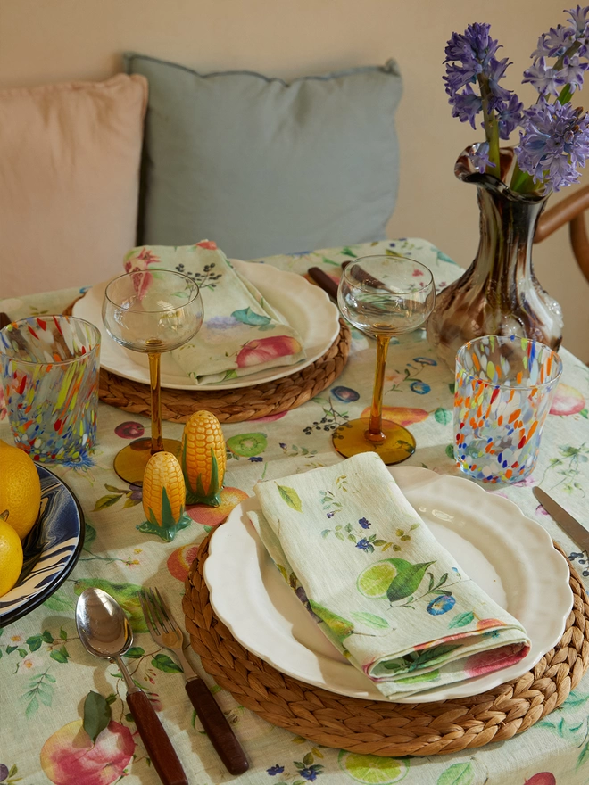 Table dressed with fruit printed table linen