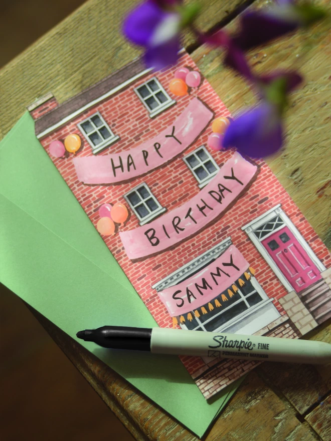 Birthday card with a house design with a sharpie pen.