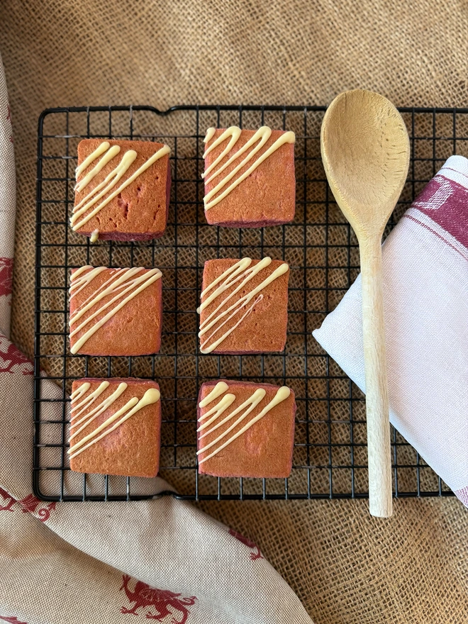 Rhubarb and Custard Welsh Cakes on a cooling rack