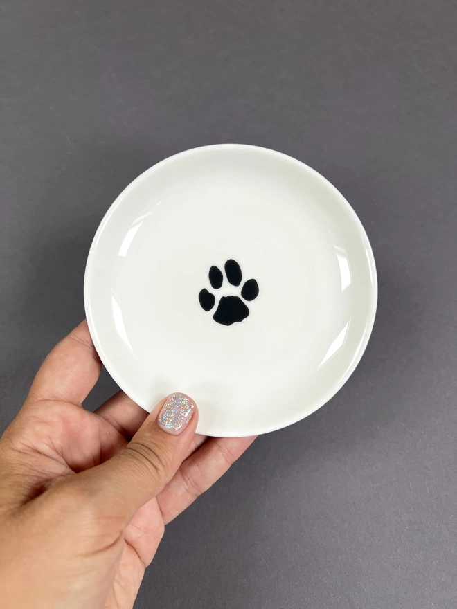 A round trinket tray with a Cockapoo paw on it make a lovely gift for any occasion