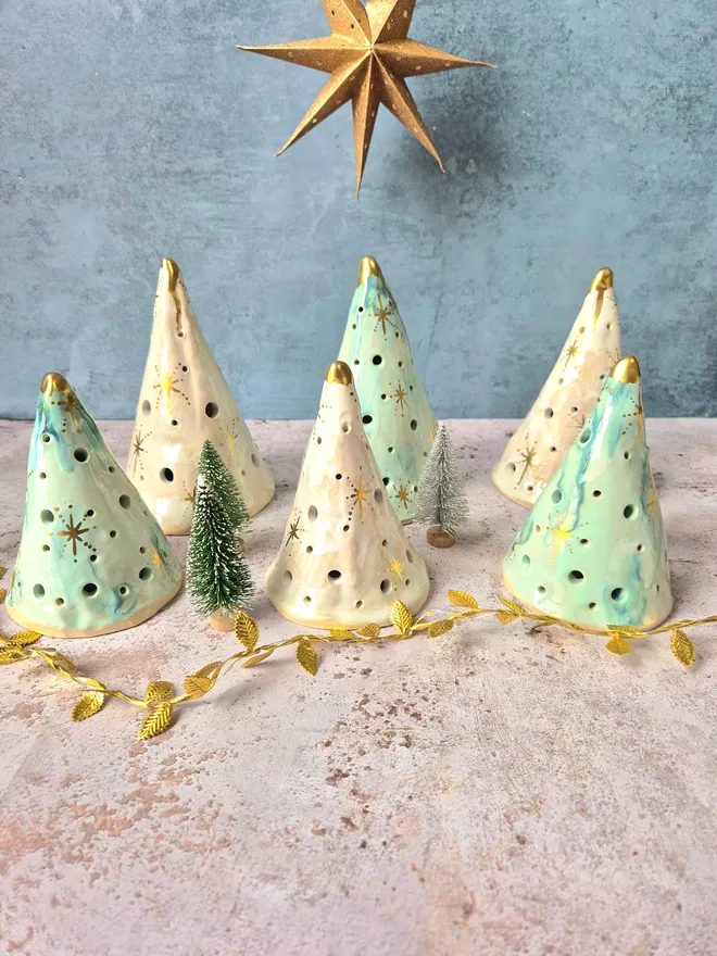 Ceramic christmas tree tea light holder, clay, pottery, Christmas decor, mantlepiece decor, christmas decoration, white with gold details, photographed with a gold star and gold leaves