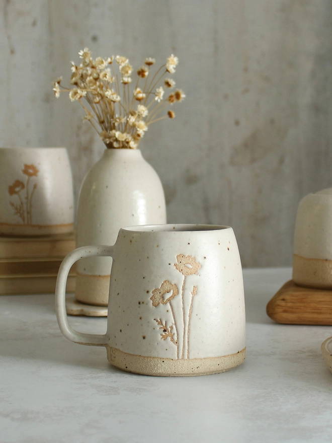 Poppy white mug on table setting