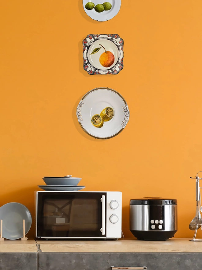 fruity plates in orange room
