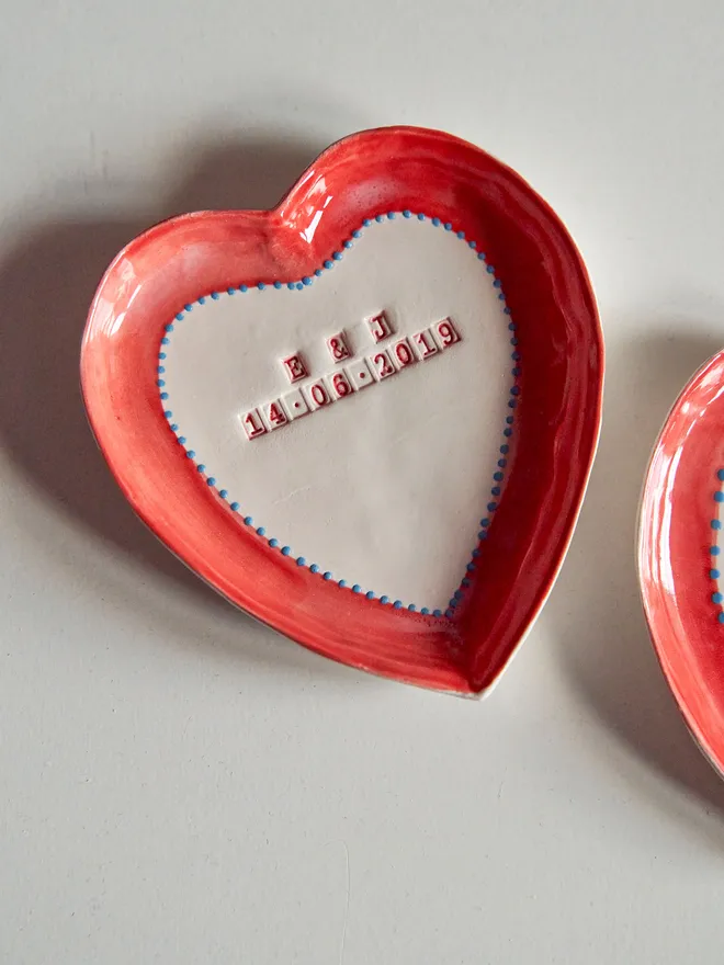 Personalised ceramic heart trinket dish. A personalised heart ceramic dish with a name and date stamped in the middle.