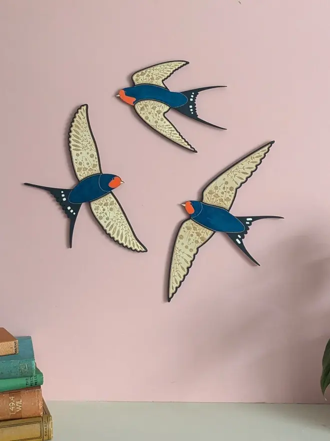 Flying Wooden Barn Swallows Hanging Wall Decor (Set Of 3), wooden barn swallow flying in a group hung on a wall. 