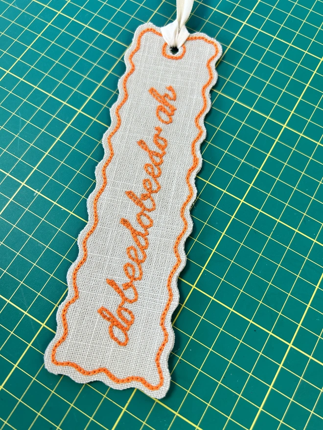 embroidered linen bookmark orange thread