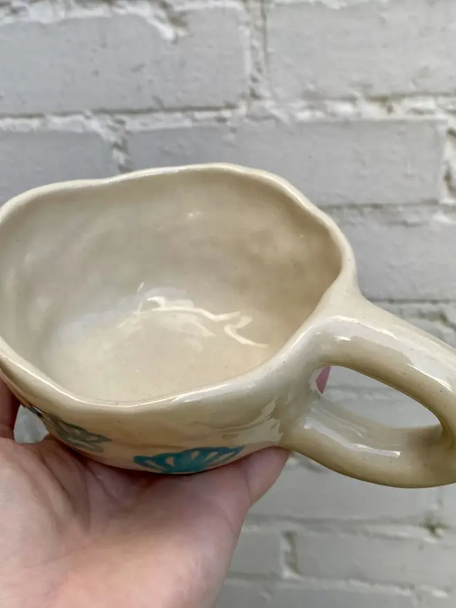 handmade ceramic smiley face shell mug