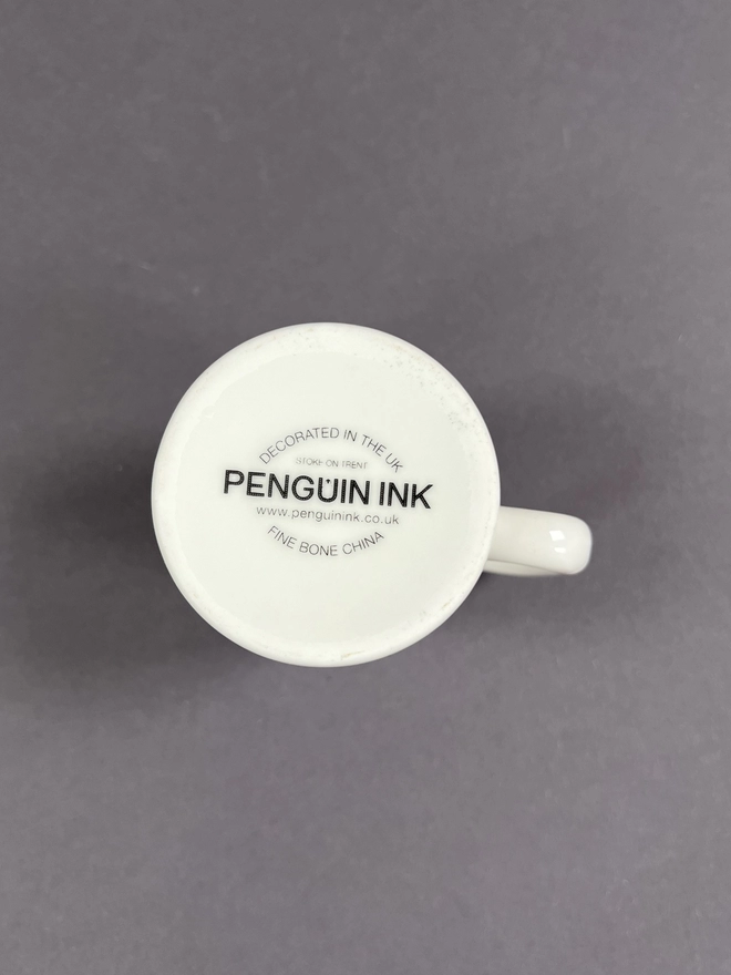 Bottom of the mug showing the penguin Ink logo decal