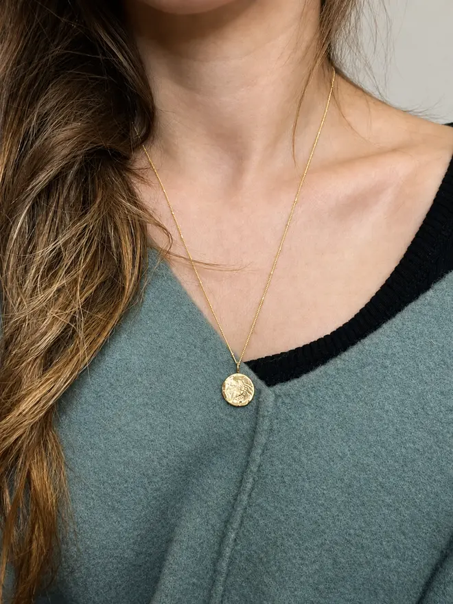 Handmade recycled sterling silver moon pendant necklace with organic sand-cast texture on a delicate satellite chain, inspired by the phrase ‘Love you to the moon and back’. Personalised gift jewellery by Celina C Jewellery, a small UK business, find on Holly and Co.